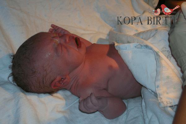 natural delivery with spontaneous pushing - baby is born